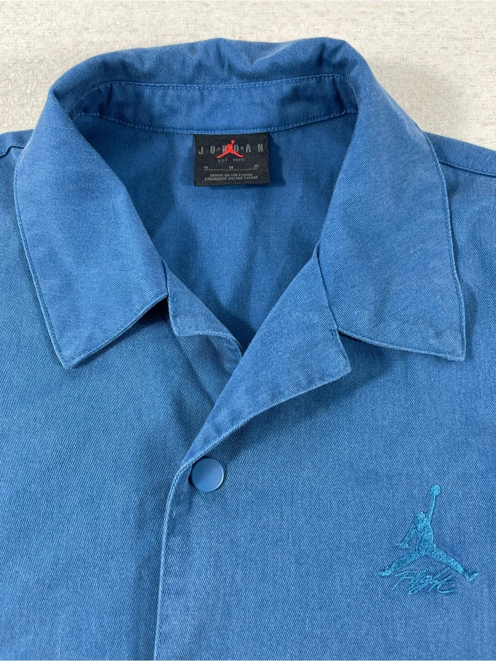 Jordan JumpmanY2K, Polo Medium Blue Short Sleeve Air Jordan Golf Shirt. SKU#0375